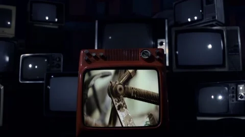 Dramatic Explosion of a Retro TV Showing Paper Roll Production Video stock 117661599