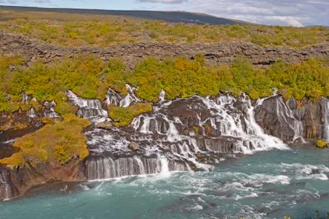 Dramatic Falls Streaming out of  Lava Field Stockfoto's