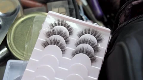 Dramatic False Lashes Ready for Glamorous Makeup Application Stock Footage 314412678
