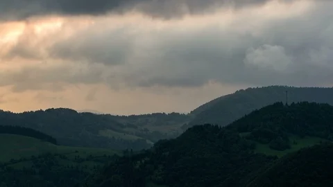 Dramatic fast clouds over green country Time lapse Stock Footage 86845012