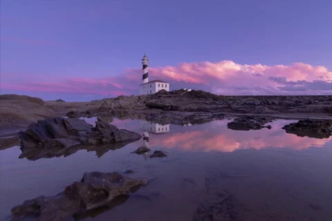 Dramatic Favaritx Lighthouse reflection timelapse at sunset 스톡 동영상 227169378