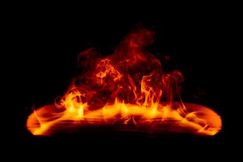 Dramatic fire and smoke effect glowing red and yellow colors exploding outw.. Stock Photos