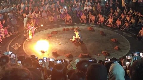 Dramatic Fire Show at Uluwatu Kecak Dance  Hanoman Escapes the Ring of Fire Stock Footage 303933177