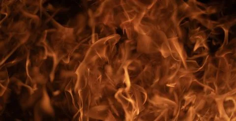 Dramatic fire texture. Burning fire pattern. Glowing flames. Fire background Stock Photos