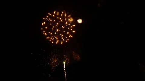 A dramatic fireworks display in the night sky Stock Footage 337887307
