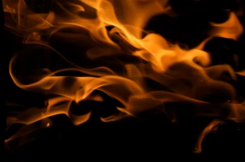 Dramatic Flames Against A Dark Background Stock Photos