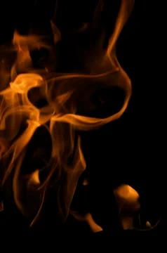 Dramatic Flames Against A Dark Background Stock Photos