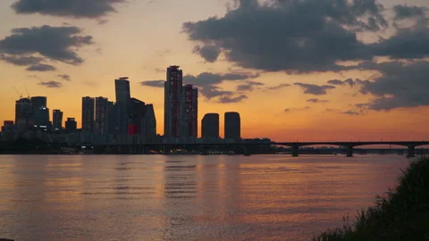 Dramatic Flaming Sunset over Yeouido FInancial District With Silhouetted Stock Footage 250121673