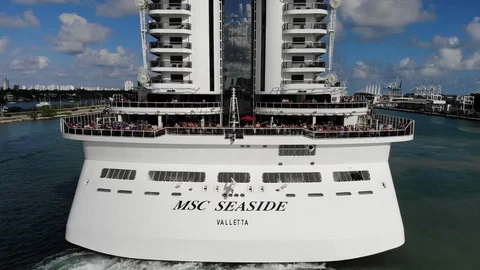 Dramatic flyover the new MSC SEASIDE cruise ship leaving the Port of Miami Stock Footage 111824741