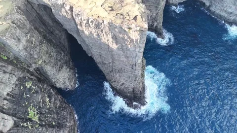 Dramatic Flyover of Sea Cliff and Sørvágsvatn Lake, Faroe Islands – 4K Aerial Stock Footage 313496977