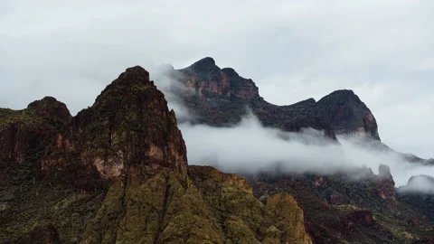 Dramatic Fog Among the Peaks of the Superstition Mountains in Arizona Stock Footage 231974710