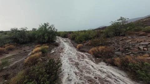 Dramatic Footage Of Fast Running Desert Wash After Heavy Monsoon Rain Storm Stock Footage 345908957