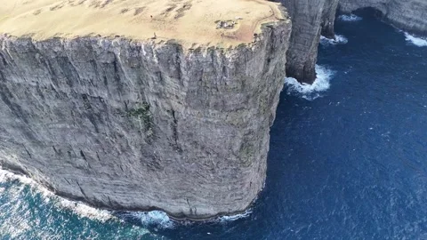 Dramatic Forward 4K Drone Flight Over Trælanípa Cliffs, Faroe Islands Stock Footage 313496933