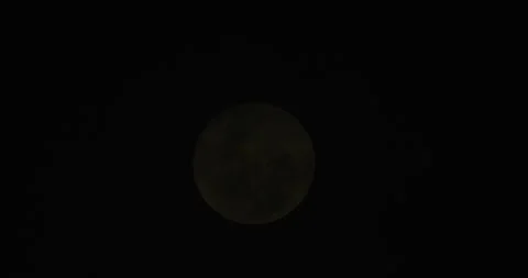 Dramatic Full Moon Behind Clouds in Australia Stock Footage 332961582
