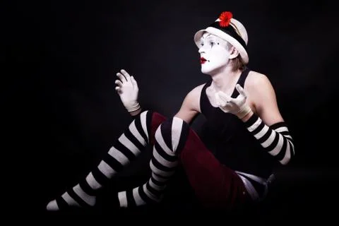 Dramatic funny mime in white hat Stock Photos