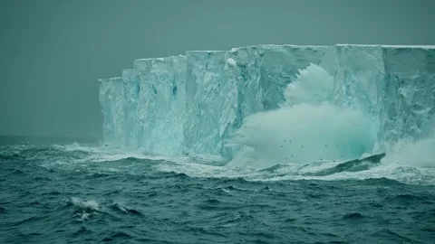 Dramatic Glacier Calving with Powerful Waves and Splash in Polar Sea Stock Footage 315094290