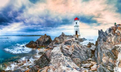 Dramatic gloomy view of Capo Ferro Lighthouse. Foto stock