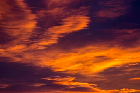 Dramatic glowing clouds in fiery orange at sunset,Calgary, Alberta, Canada Stock Photos