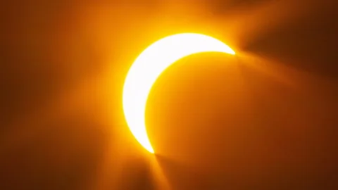 Dramatic glowing solar eclipse with flares Stock Footage 342572332