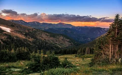 Dramatic Glowing Sunset over the Rocky Mountains, Rocky Mountain National Park Stock Photos