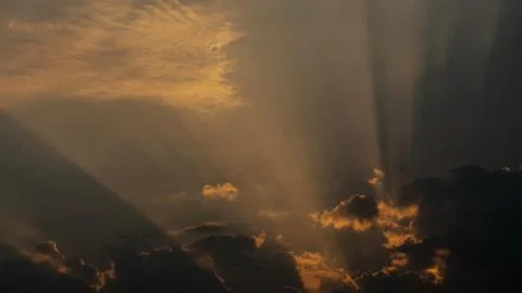 Dramatic God Rays in this Sunrise Landscape. Stock Photos