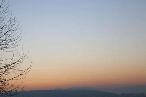 Dramatic gold sky during sunset Stock Photos