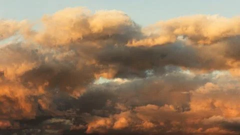 Dramatic Golden Clouds and Sky Texture at Sunset Stock Photos