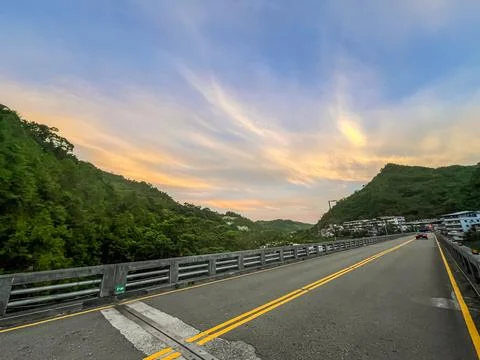 Dramatic Golden Dawn Sky with Clouds Over Mountains in Wulai, Taiwan. Stock Photos