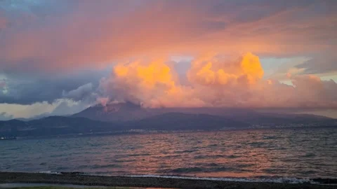 Dramatic Golden Hour Clouds Over Coastal Mountain Range Видео 335244698