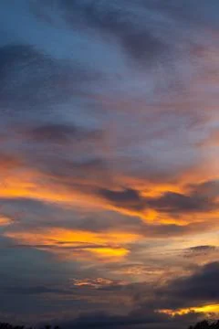 Dramatic Golden Hour Sky With Clouds Stock Photos