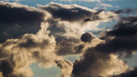 Dramatic Golden Light Bursting Through Dark Storm Clouds Time-Lapse Stock Footage 318296411