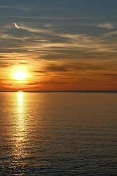 Dramatic Golden Sunset over the Black Sea. Beautiful sunset over the sea. Stock Photos