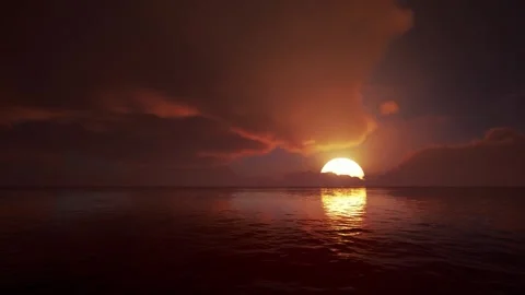 Dramatic golden sunset over the calm sea ocean water with dense clouds Stock Footage 338229882