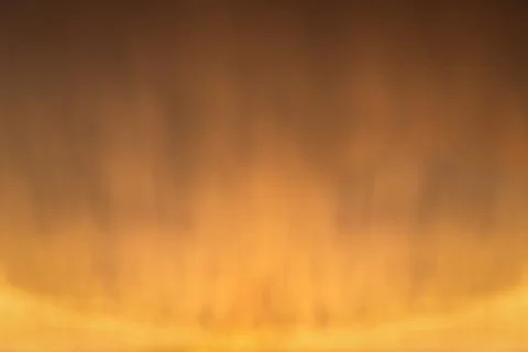 Dramatic golden sunset sky with falling rain Stock Photos