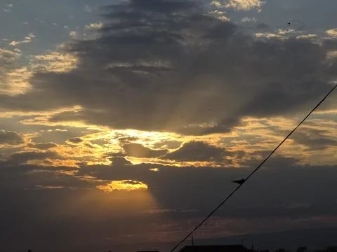 Dramatic Golden Sunset With Stormy Clouds Stock Photos