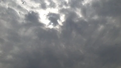 Dramatic GoPro timelapse of sun breaking through storm clouds Stock Footage 106403743