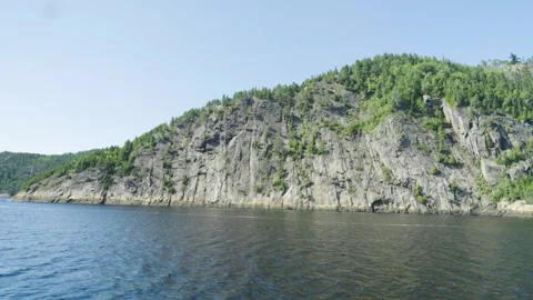 Dramatic Granite Cliff Face Along the Saguenay Fjord Vídeos de archivo 338327358