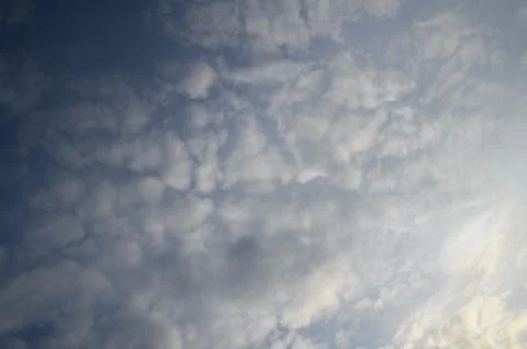 Dramatic Gray Clouds Over Blue Sky Stock Photos