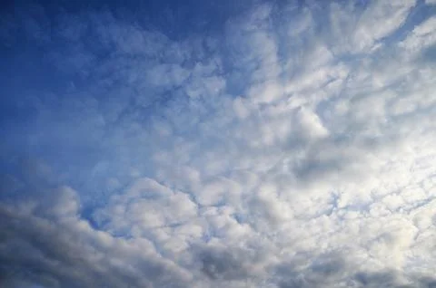 Dramatic Gray Clouds Over Blue Sky Stock Photos