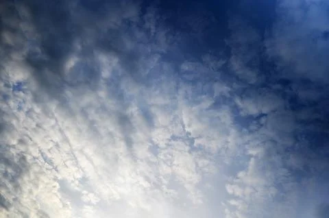 Dramatic Gray Clouds Over Blue Sky Stock Photos