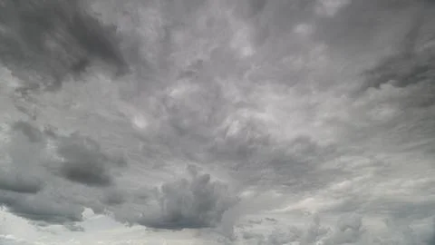 A Dramatic Gray Cloudy Sky featuring Dynamic Cloud Patterns that capture the ima Stock Photos