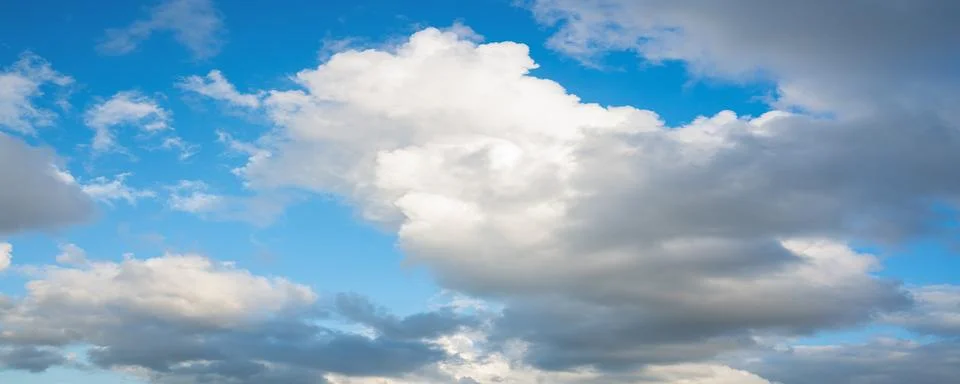 Dramatic Gray Storm Clouds with Blue Sky Stock Photos