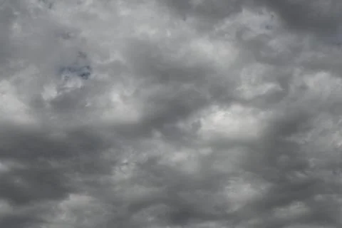 Dramatic gray storm clouds filling the sky 스톡 사진