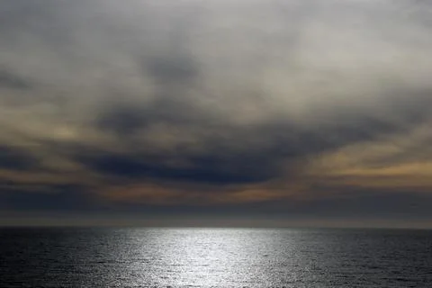 Dramatic gray sunset on the Pacific Ocean in California, USA, Summer, Background Stock Photos