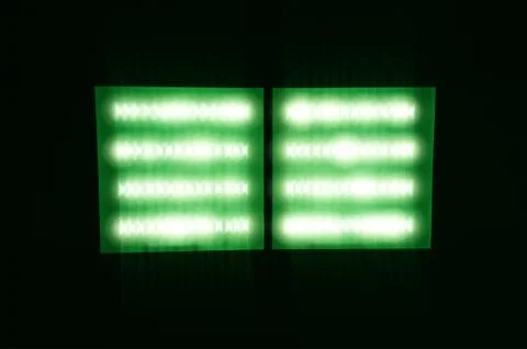 Dramatic green neon lamp background 스톡 사진