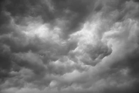 Dramatic grey clouds Stock Photos