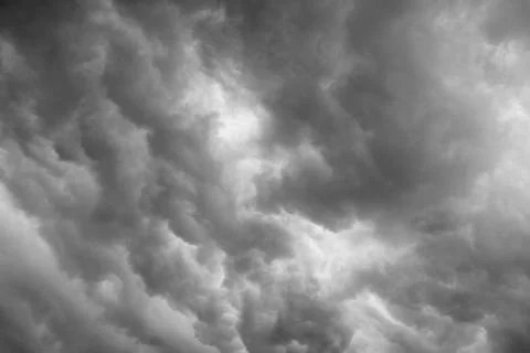 Dramatic grey clouds Stock Photos