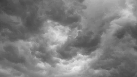 Dramatic grey clouds Stock Photos