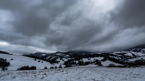 Dramatic Grey clouds sky motion fast in winter countryside landscape Time lapse Stock Footage 261605566