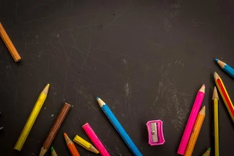 Dramatic group of pencils on black or dark background. Stock Photos